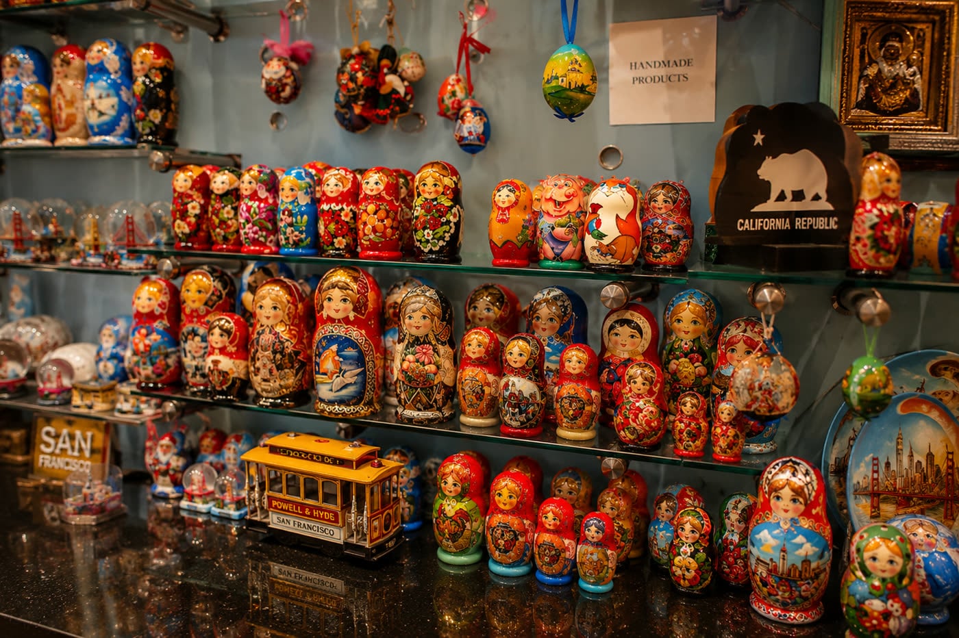 Shelves packed with hand-painted matryoshka dolls and colorful souvenirs
